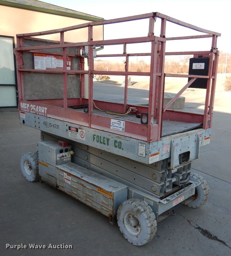 image for item DL2208 1999 Mec 2548HT  scissor lift