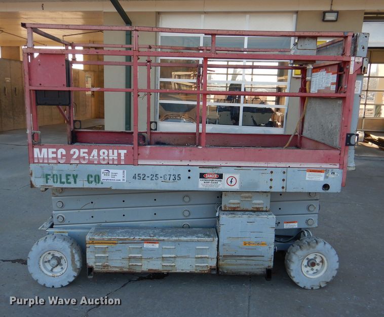 image for item DL2208 1999 Mec 2548HT  scissor lift