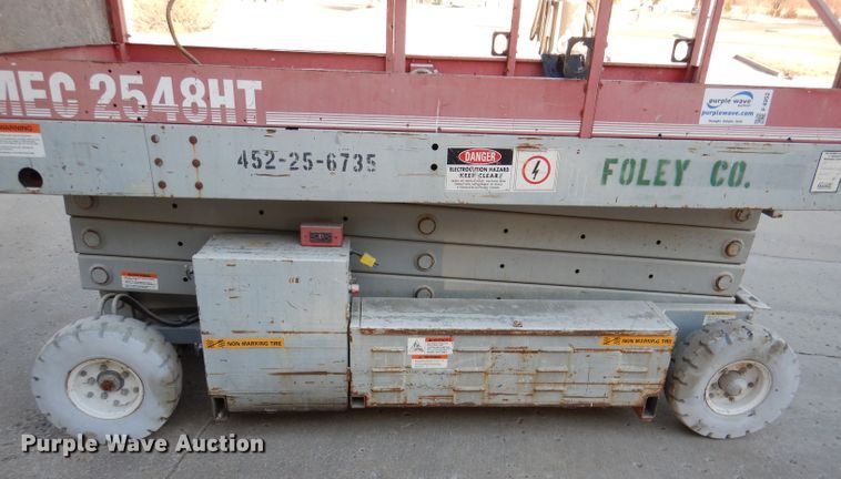 image for item DL2208 1999 Mec 2548HT  scissor lift
