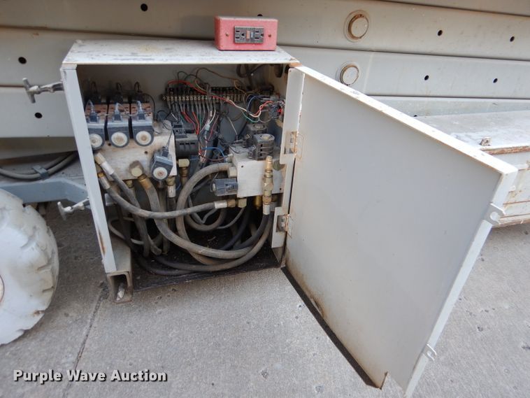 image for item DL2208 1999 Mec 2548HT  scissor lift