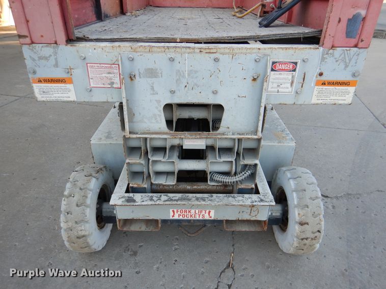 image for item DL2208 1999 Mec 2548HT  scissor lift