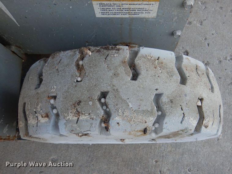 image for item DL2208 1999 Mec 2548HT  scissor lift