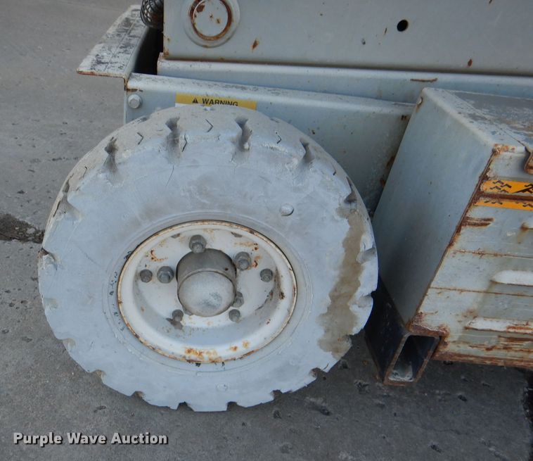 image for item DL2208 1999 Mec 2548HT  scissor lift