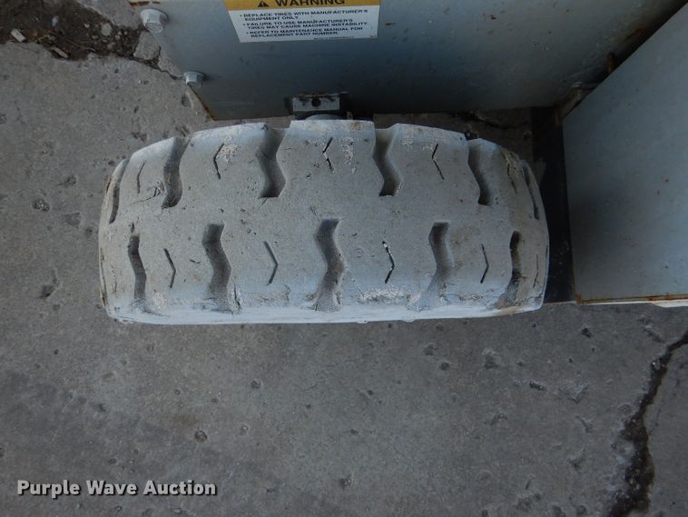 image for item DL2208 1999 Mec 2548HT  scissor lift