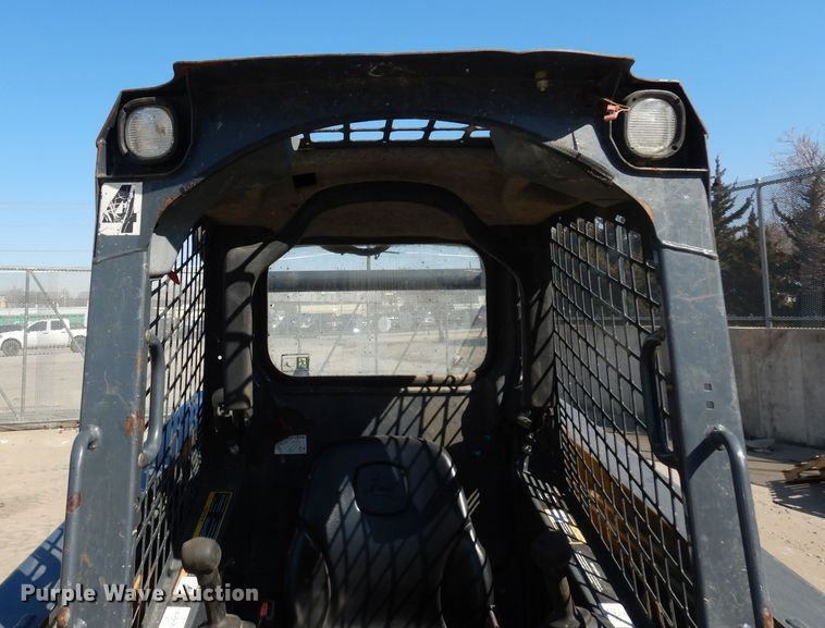 image for item HD9721 2013 John Deere 318D  skid steer loader