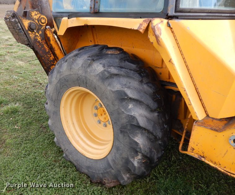 image for item HO9332 1990 John Deere 310C  backhoe