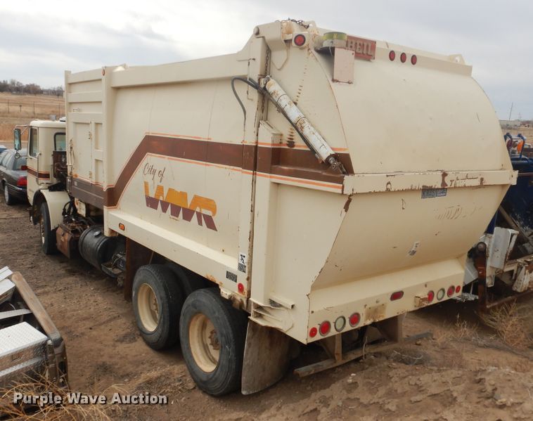 image for item DI5511 1992 White GMC WX Xpeditor  refuse truck
