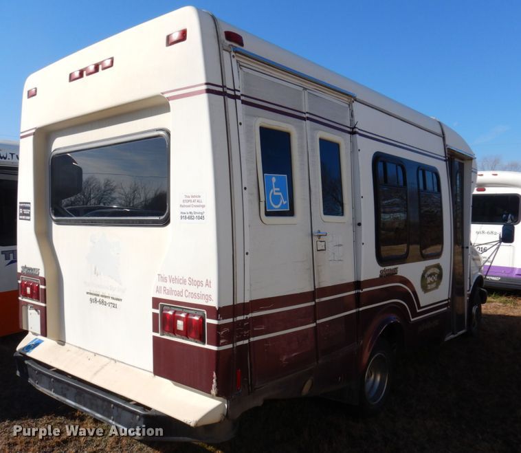 image for item HW9857 2000 Chevrolet Express  shuttle bus