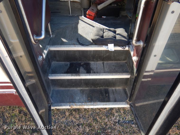 image for item HW9857 2000 Chevrolet Express  shuttle bus