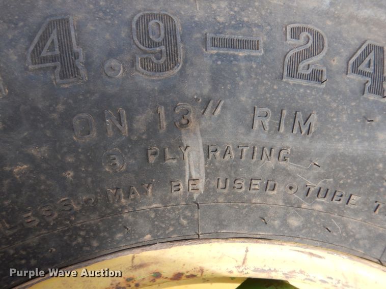 image for item HL9345 (2) Firestone 14.9-24 tires and wheels