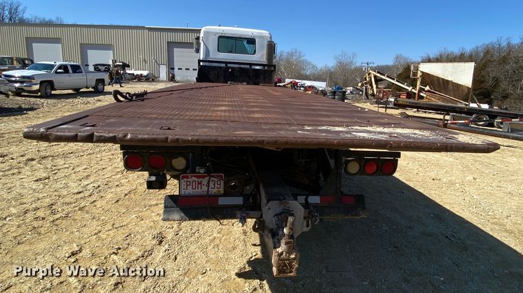 image for item HR9467 1989 Mack MH613  rollback truck