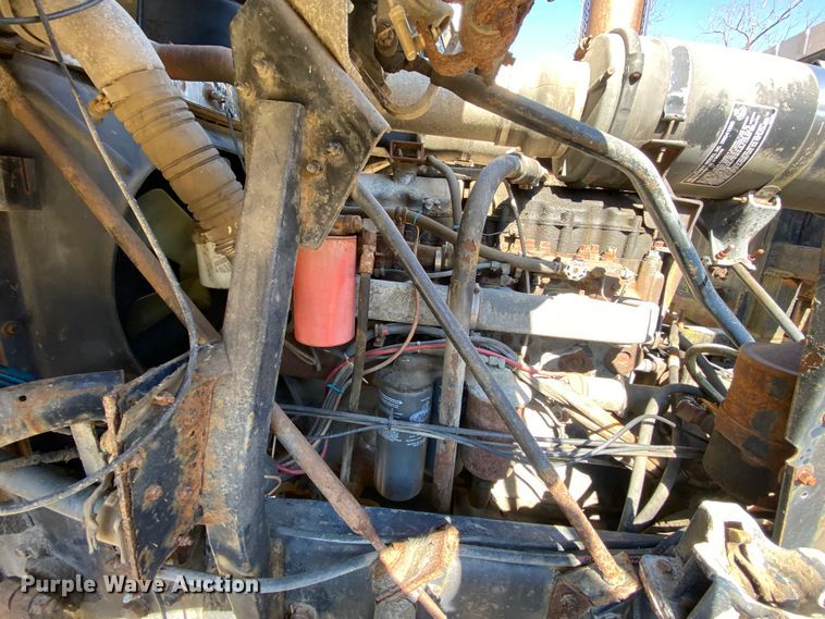 image for item HR9467 1989 Mack MH613  rollback truck