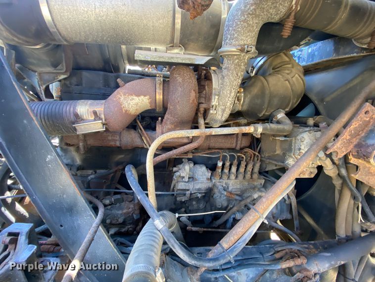 image for item HR9467 1989 Mack MH613  rollback truck