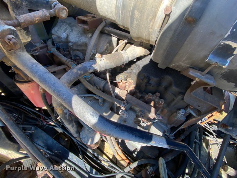 image for item HR9467 1989 Mack MH613  rollback truck