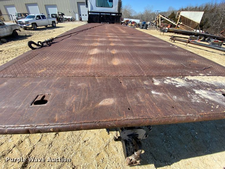 image for item HR9467 1989 Mack MH613  rollback truck