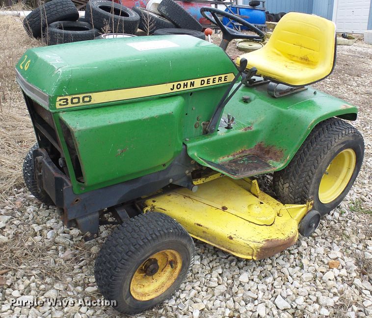 image for item DL0912 (3) lawn mowers