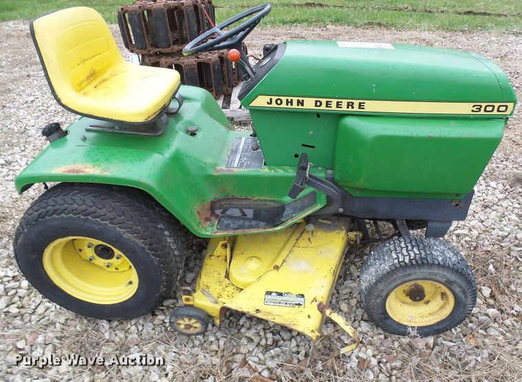 image for item DL0912 (3) lawn mowers