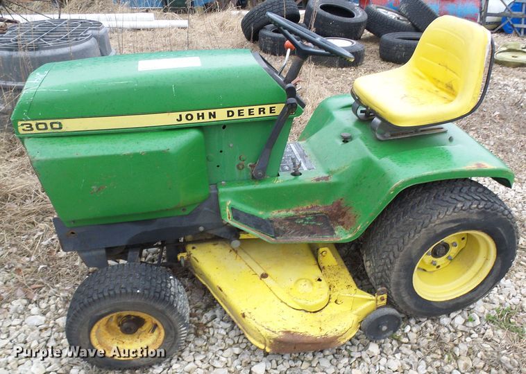 image for item DL0912 (3) lawn mowers