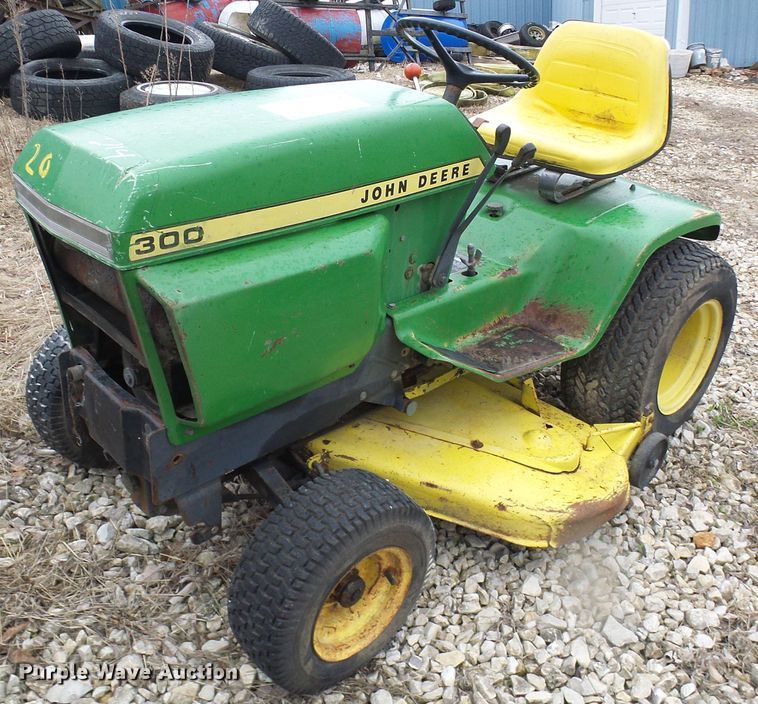 image for item DL0912 (3) lawn mowers