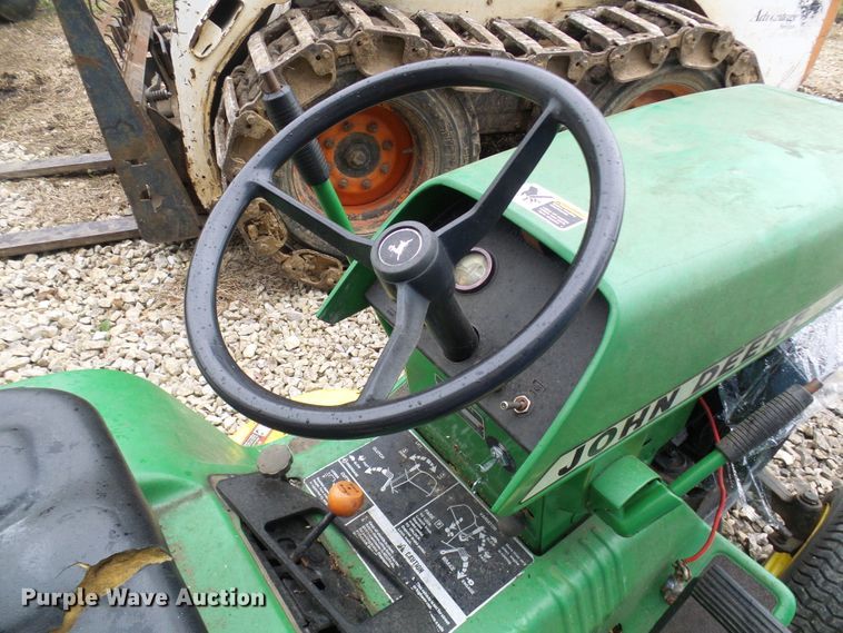 image for item DL0912 (3) lawn mowers