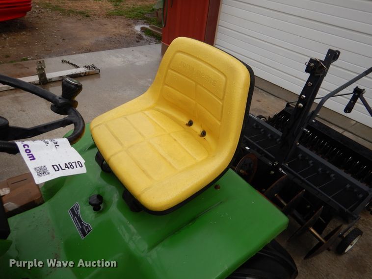 image for item DL4870 John Deere 316  lawn mower