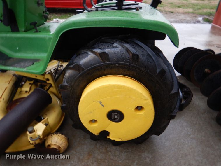 image for item DL4870 John Deere 316  lawn mower