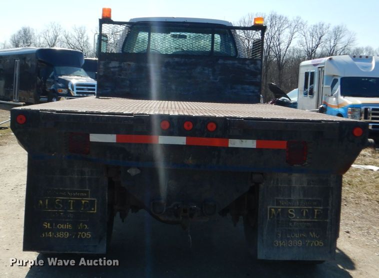 image for item GT9628 2000 Ford F750 Super Duty XL  flat bed truck