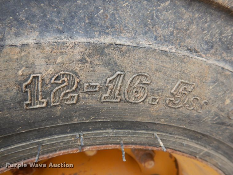 image for item DJ0396 2012 John Deere 310J  backhoe