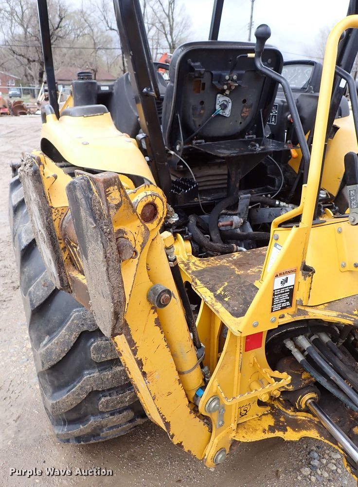 image for item DK4555 2009 John Deere 110  backhoe