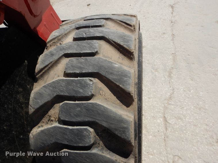 image for item DM4261 2014 Takeuchi TS70R  skid steer loader