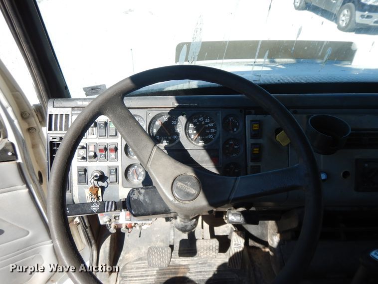 image for item GG9495 1999 Freightliner FL80  digger derrick truck
