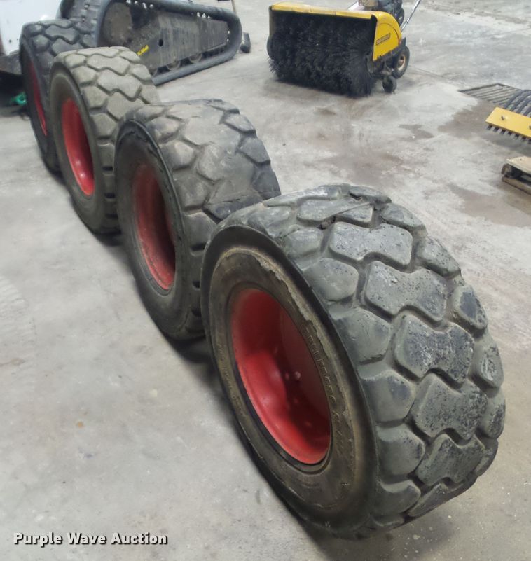 image for item HF9841 (4) Bobcat 16.5x9.76 wheels and tires