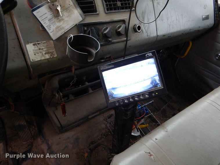 image for item DL4854 2000 Freightliner FL80  refuse truck