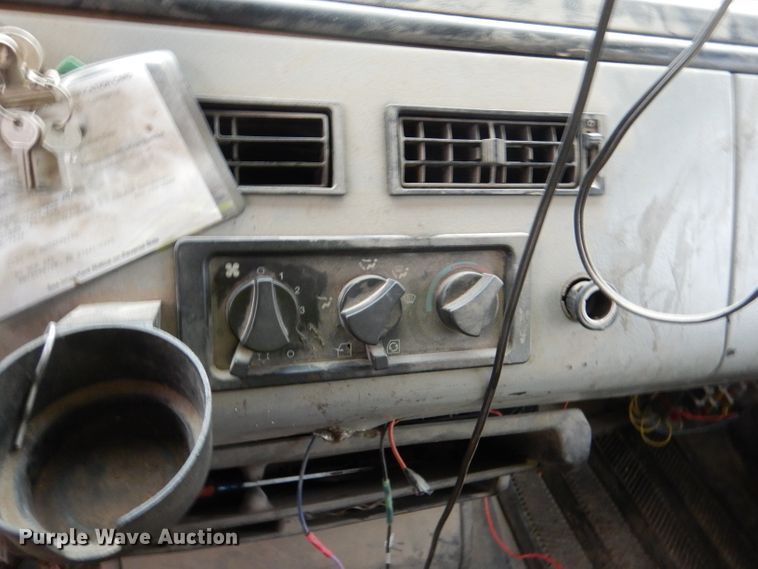 image for item DL4854 2000 Freightliner FL80  refuse truck