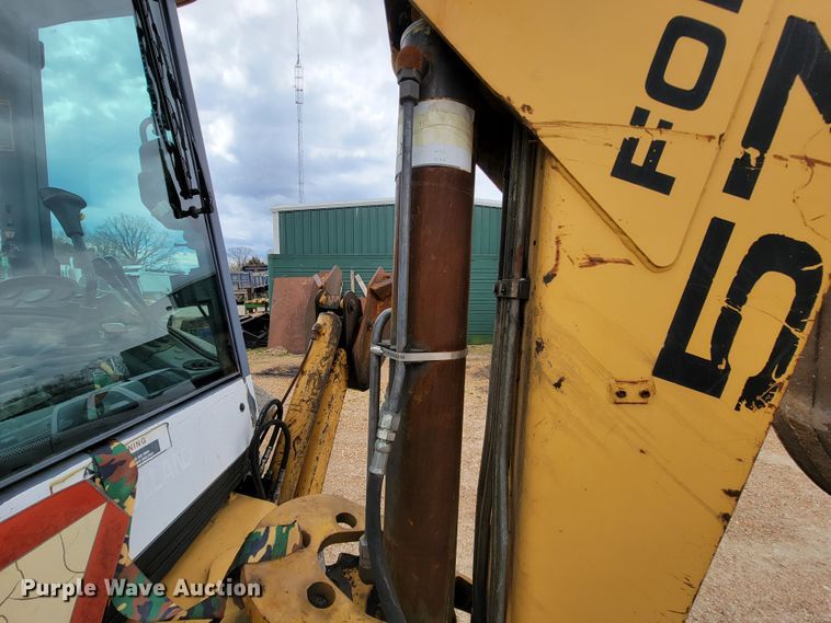 image for item FL9190 1997 New Holland 575E  backhoe