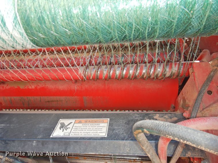 image for item DJ8355 2012 New Holland BR7090  round baler