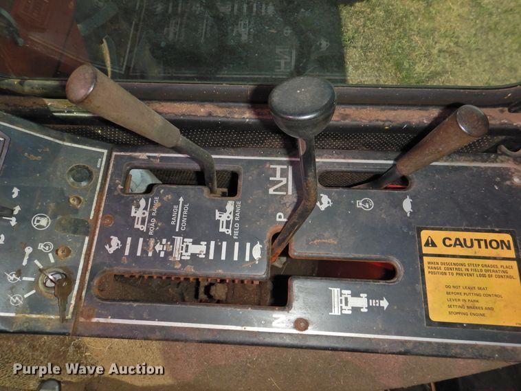 image for item DJ8362 1992 New Holland 1118  windrower