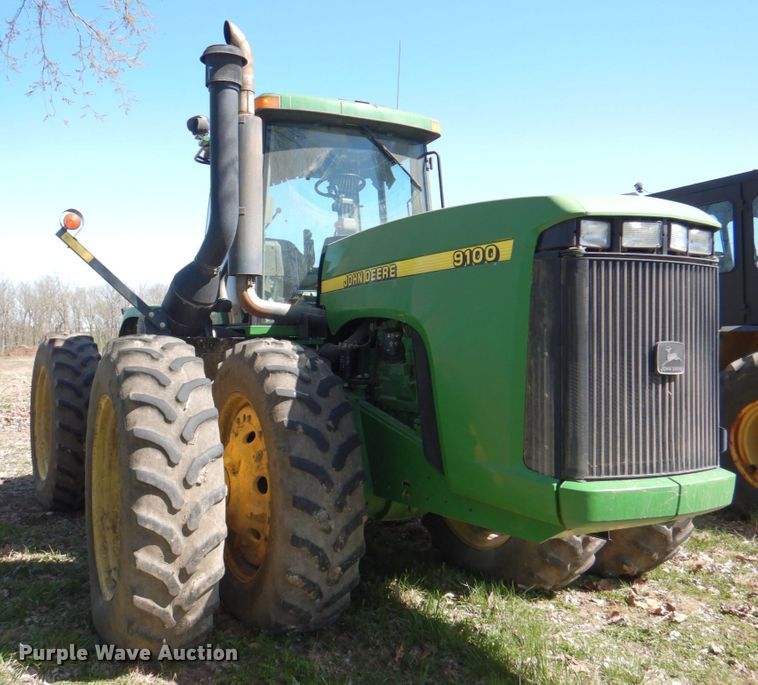 image for item II9877 2001 John Deere 9100  4WD tractor