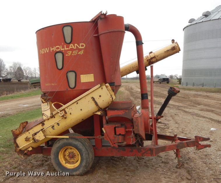 image for item IX9411 New Holland 354  feed mixer/grinder