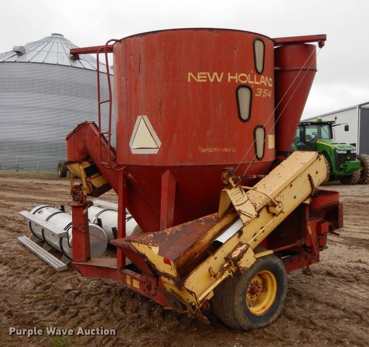 image for item IX9411 New Holland 354  feed mixer/grinder