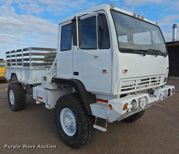 image for item DJ8341 1997 Stewart & Stevenson M1078  flatbed truck