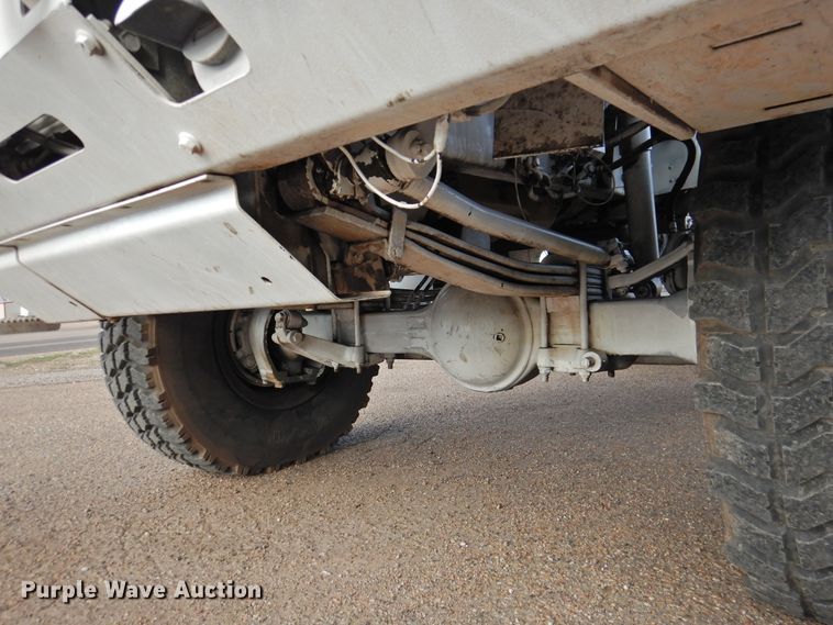 image for item DJ8341 1997 Stewart & Stevenson M1078  flatbed truck