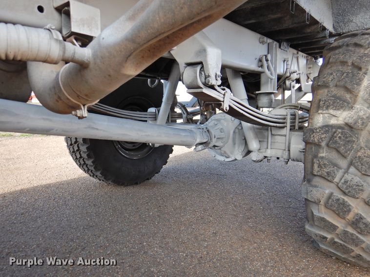 image for item DJ8341 1997 Stewart & Stevenson M1078  flatbed truck
