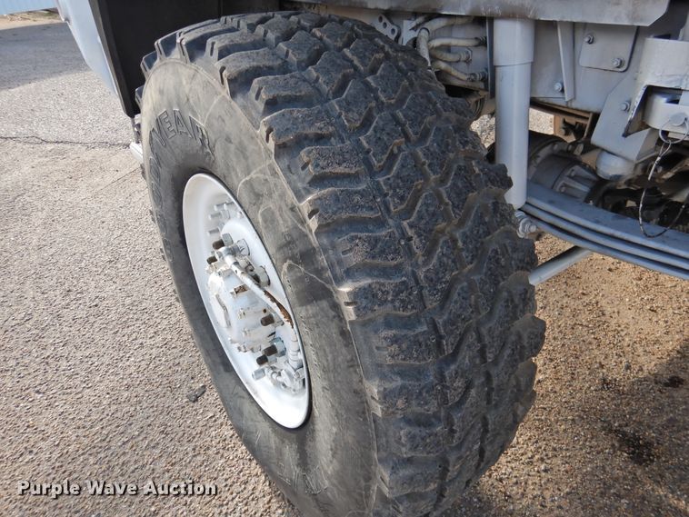 image for item DJ8341 1997 Stewart & Stevenson M1078  flatbed truck
