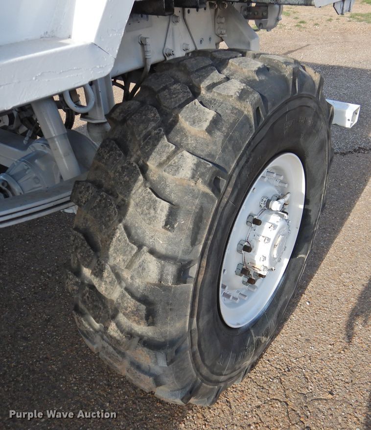 image for item DJ8341 1997 Stewart & Stevenson M1078  flatbed truck