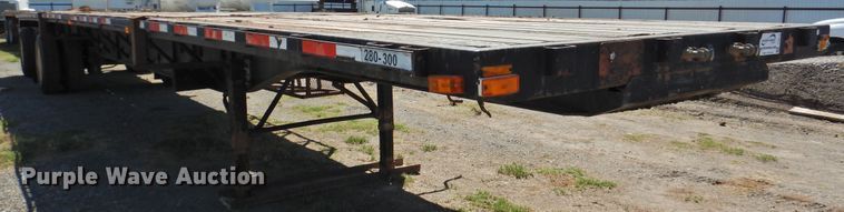 image for item DJ8414 2005 Transcraft TL-2000HW2  flatbed trailer