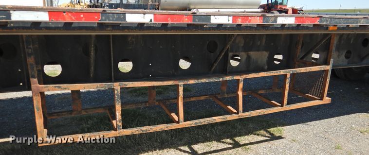 image for item DJ8414 2005 Transcraft TL-2000HW2  flatbed trailer
