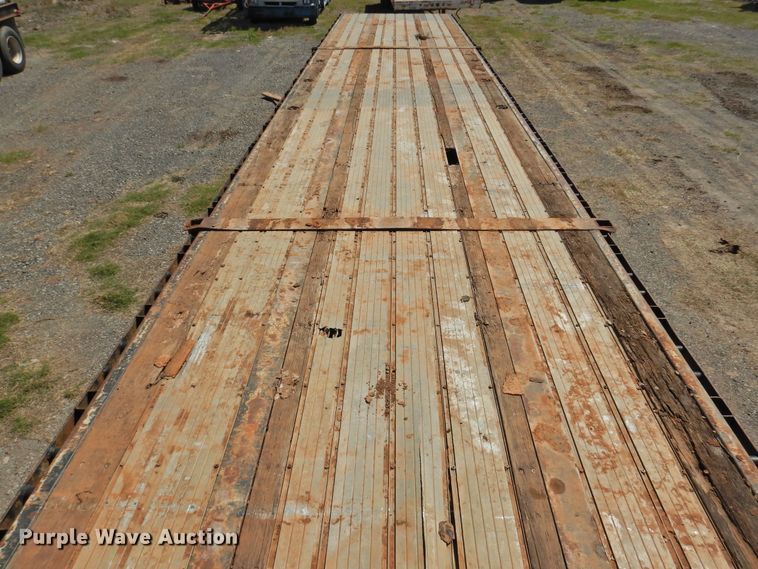 image for item DJ8414 2005 Transcraft TL-2000HW2  flatbed trailer