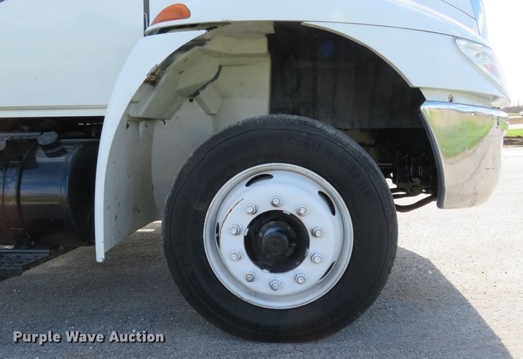 image for item HV9704 2005 International 4300  flatbed transport truck