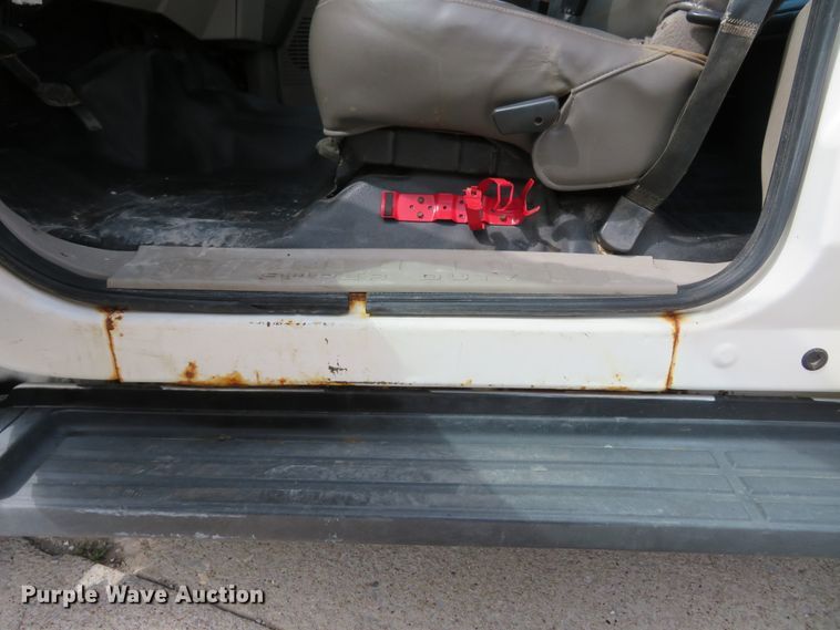 image for item FP9255 2010 Ford F450 Super Duty XL  Crew Cab dump flatbed truck